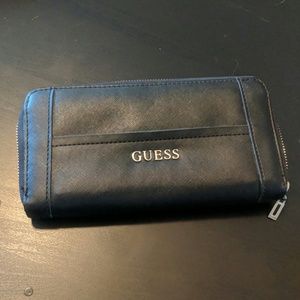 GUESS black cross patterned wallet
